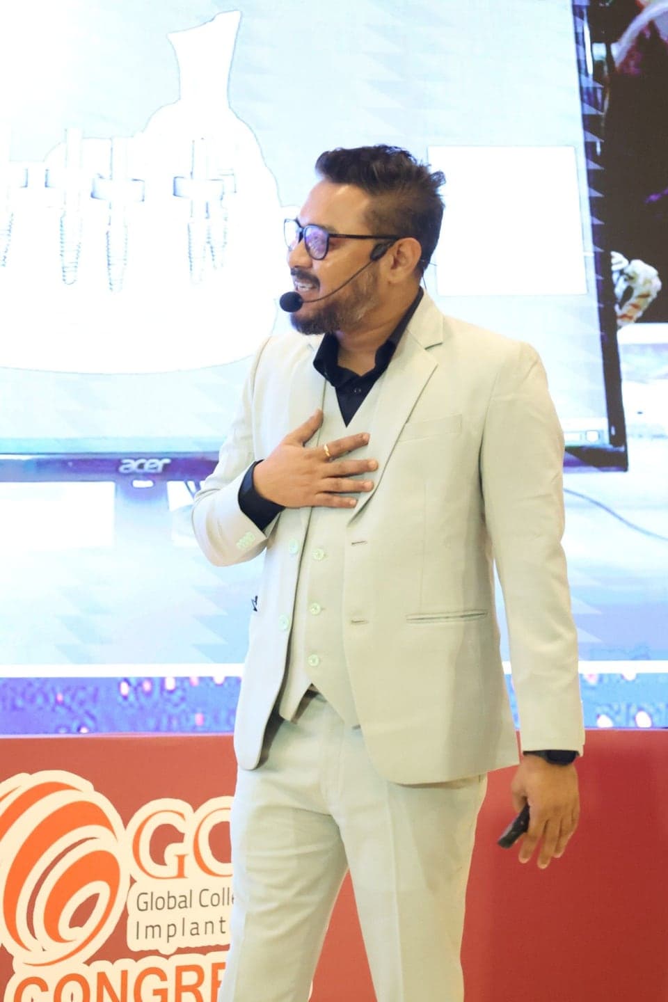 Sudeep Paul delivering a keynote at a dental congress