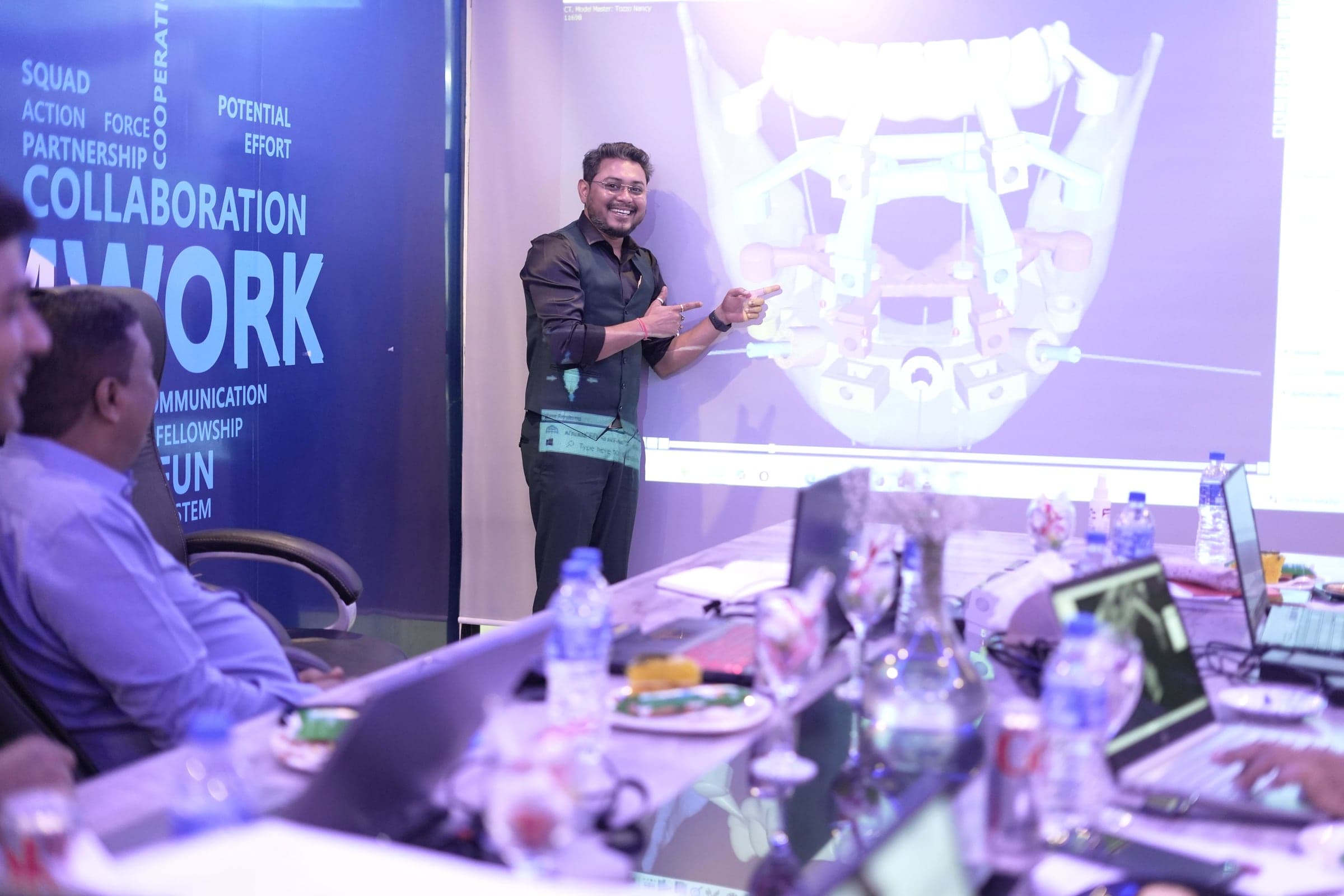 Sudeep Paul walking participants through a full-arch guided plan