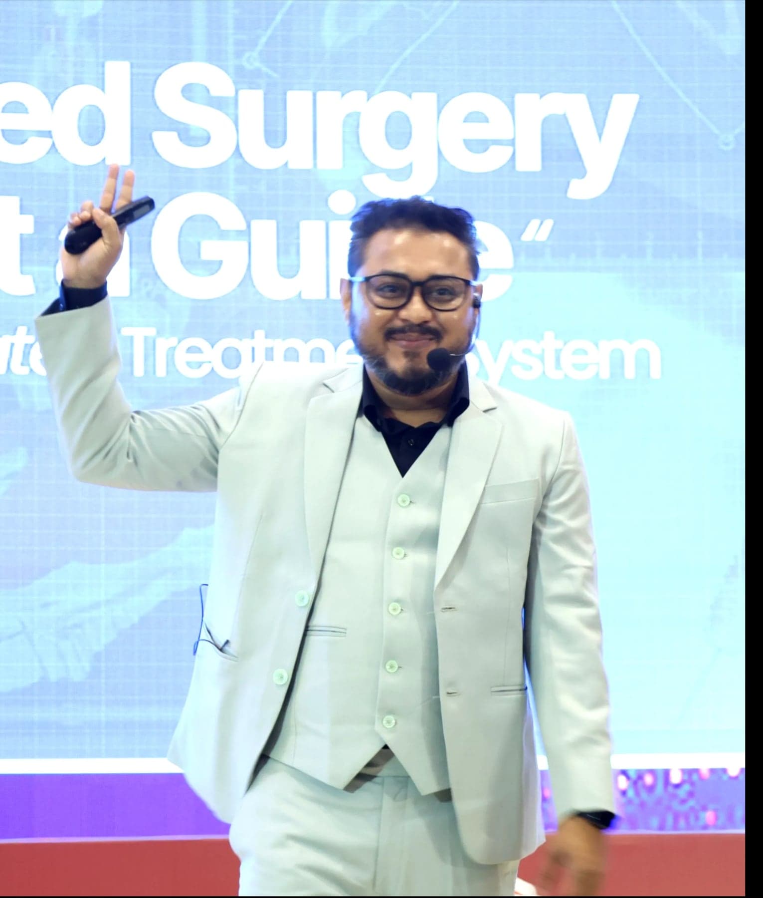 Sudeep Paul speaking on stage