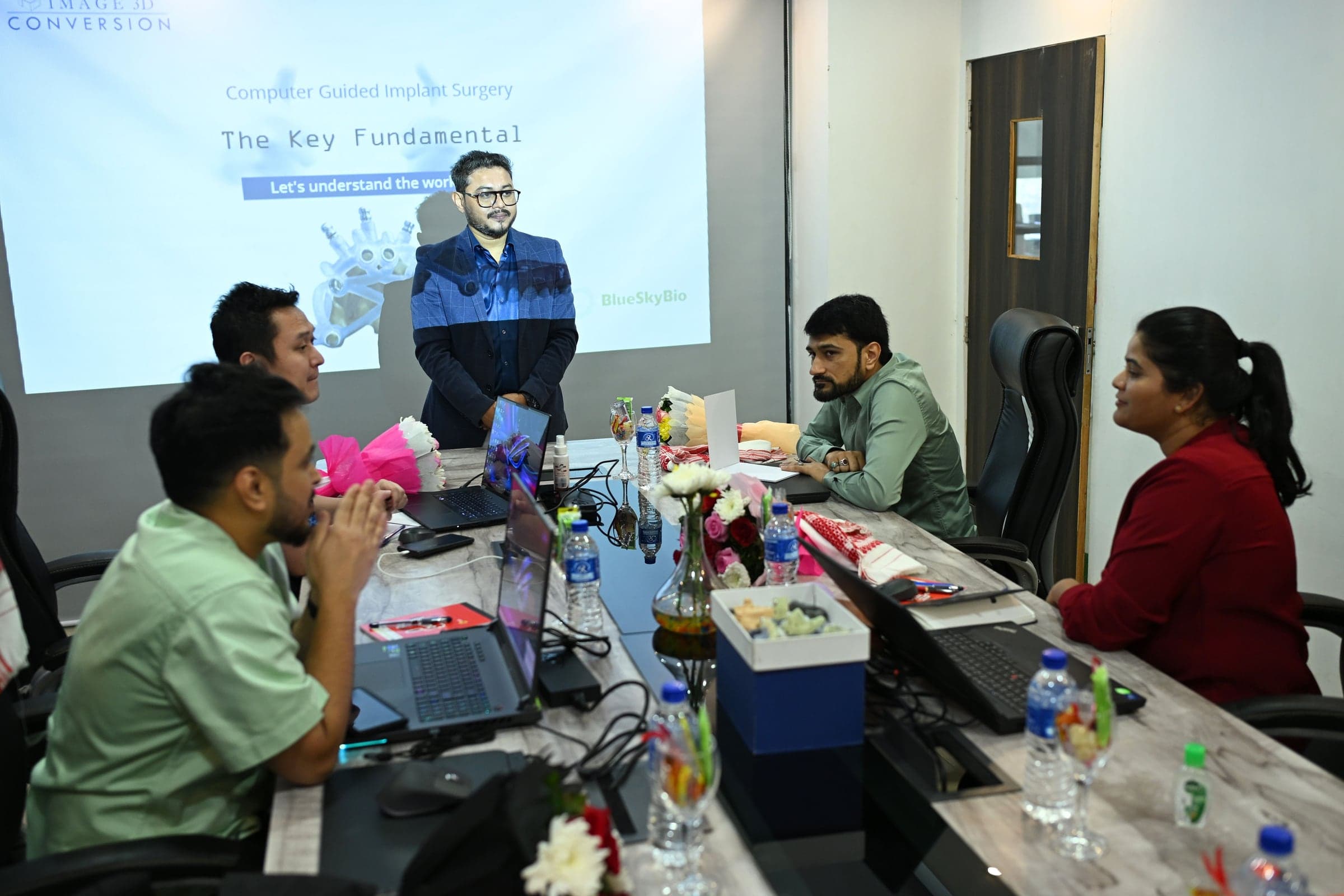 Participants working through a guided workflow at a SurgiGuideExcellence master class